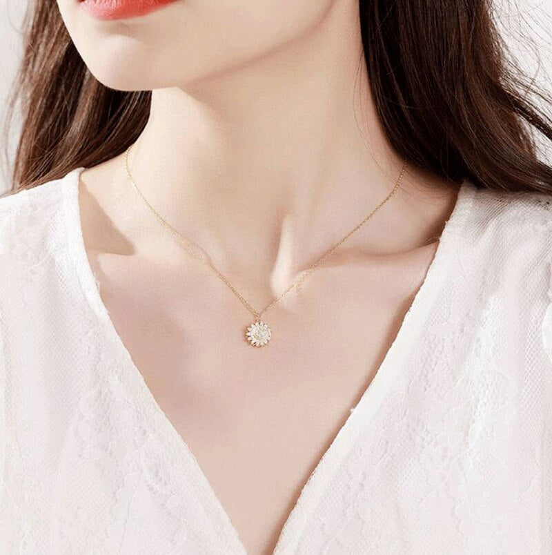 Sunflower pendant with diamonds on gold chain

