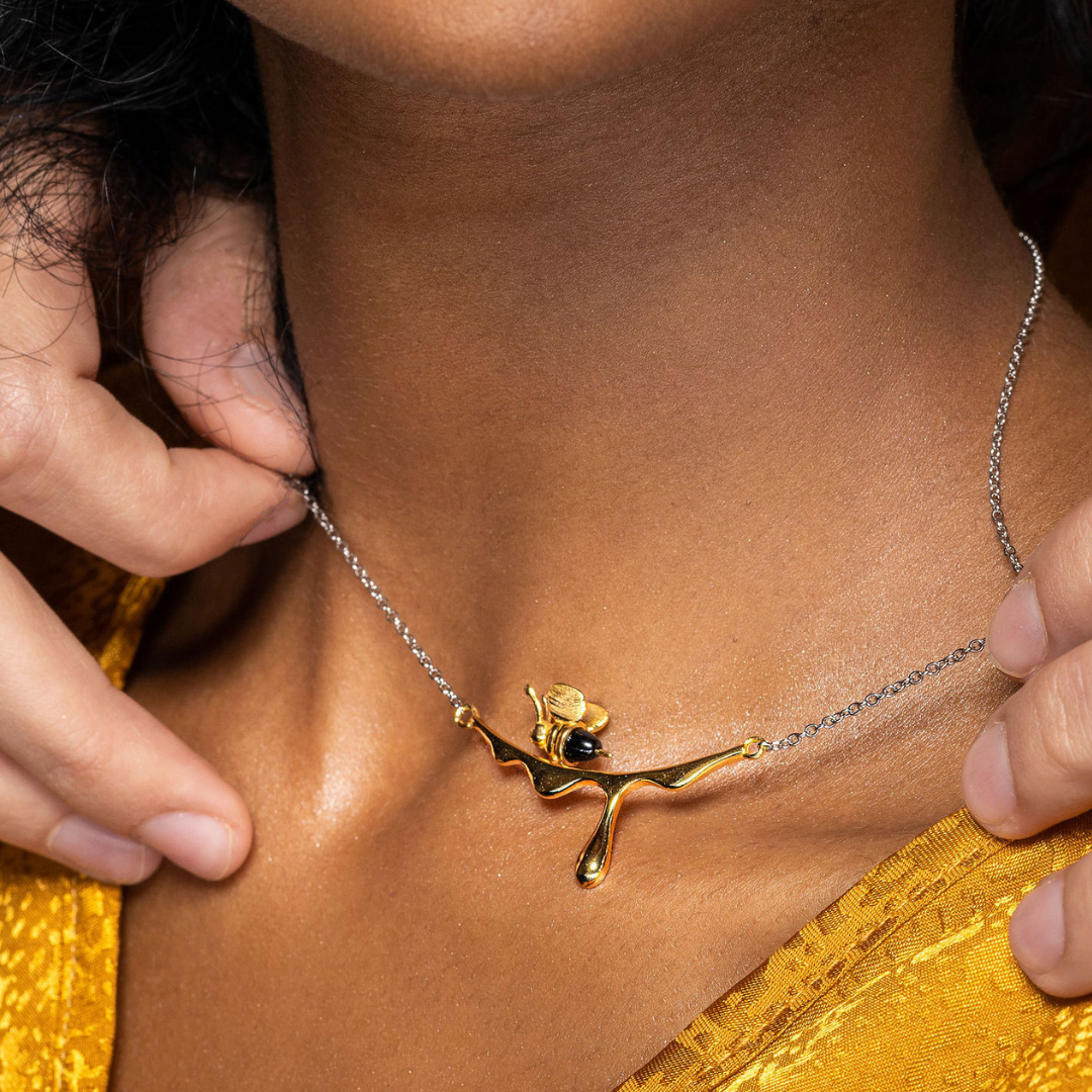 Elegant gold and silver bee pendant necklace for nature lovers

