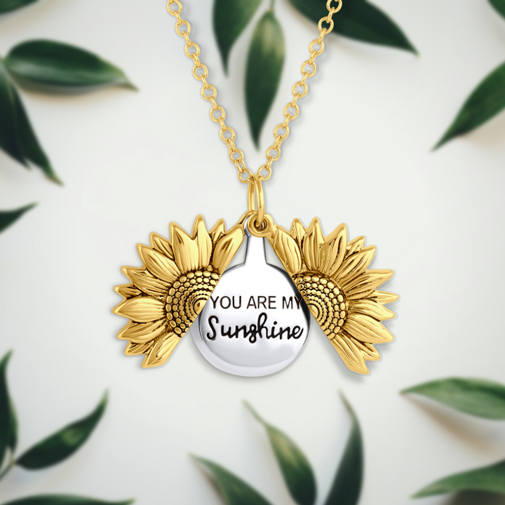 Gold sunflower locket necklace with hidden You are my sunshine engraving

