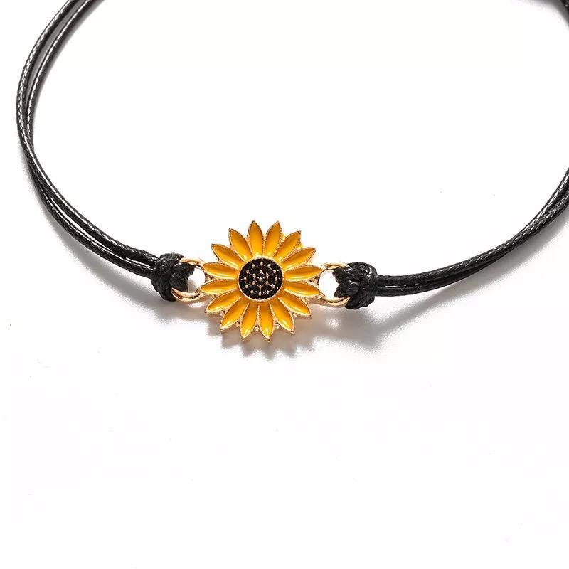 Pair of sunflower friendship bracelets with delicate yellow enamel charms, ideal for long-distance relationships, best friends, or sister gifts. Comes with a meaningful quote card.

